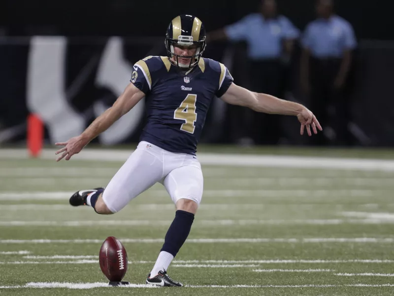 St. Louis Rams kicker Greg Zuerlein kicks off