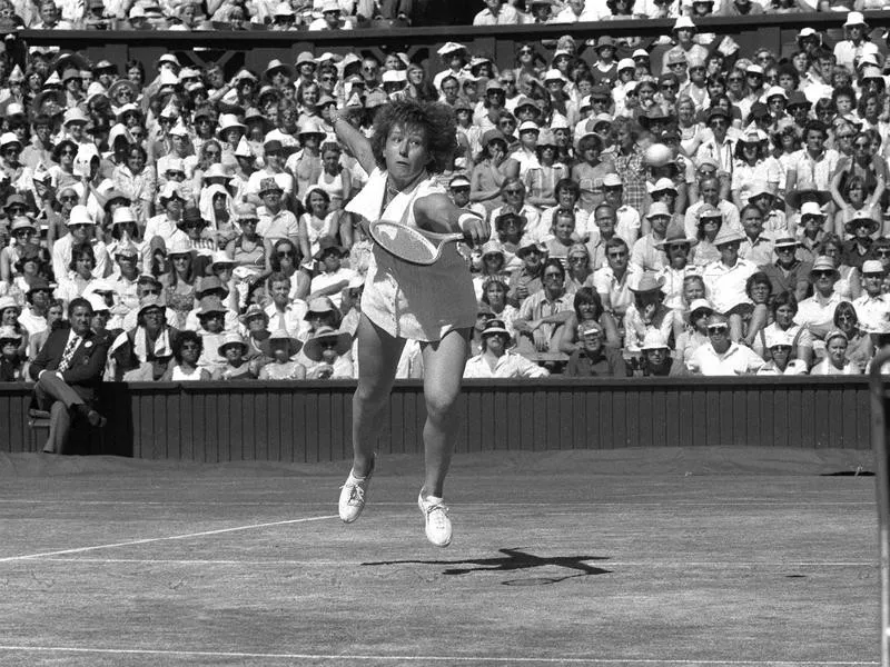 Martina Navratilova follows through