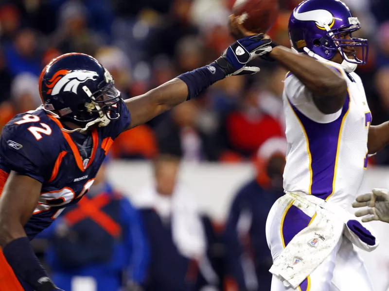 Elvis Dumervil and Tarvaris Jackson