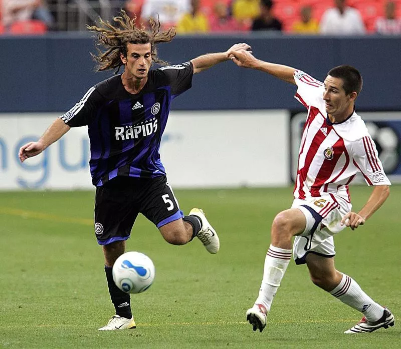 Kyle Beckerman fights for possession