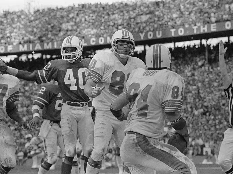 Bruce Hardy hangs onto the ball