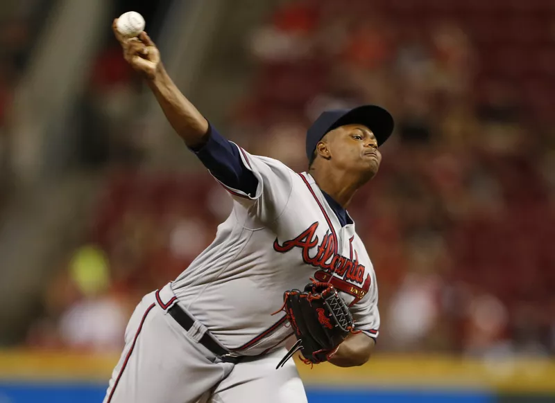 Mauricio Cabrera throws against the Cincinnati Reds