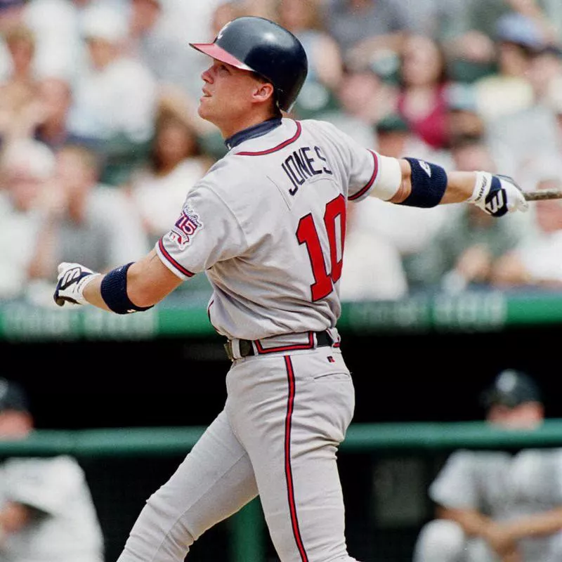 Atlanta Braves' Chipper Jones watching flight of three-run home run