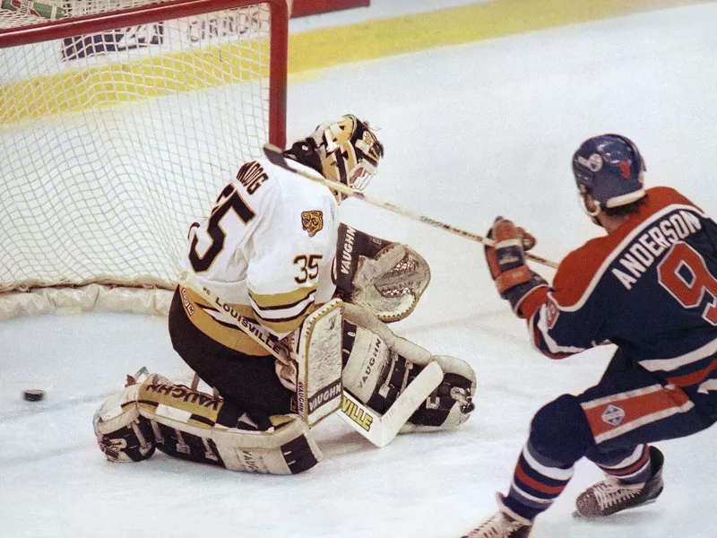 Glenn Anderson sends shot past Andy Moog