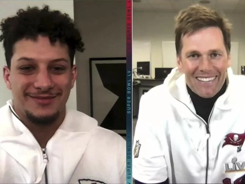 Patrick Mahomes talks with Tom Brady