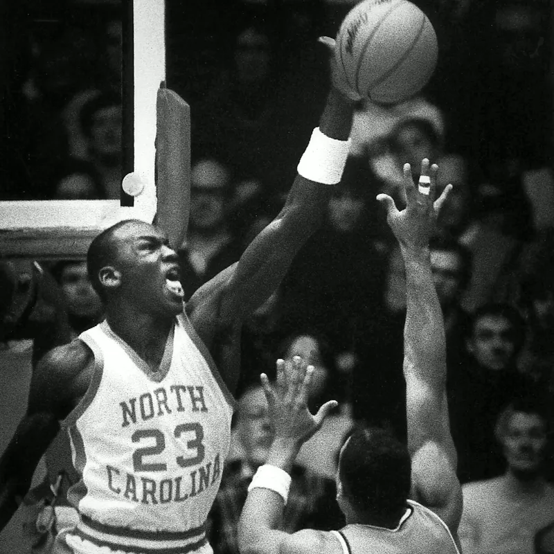 North Carolina's Michael Jordan blocks shot by Virginia's Othell Wilson