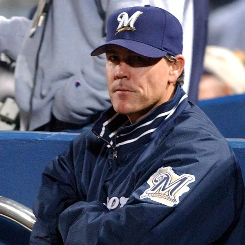 Ned Yost watches his team from the dugout