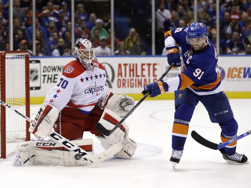 Washington Capitals goalie Braden Holtby blocks shot by John Tavares