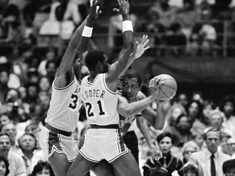 Magic Johnson and Michael Cooper