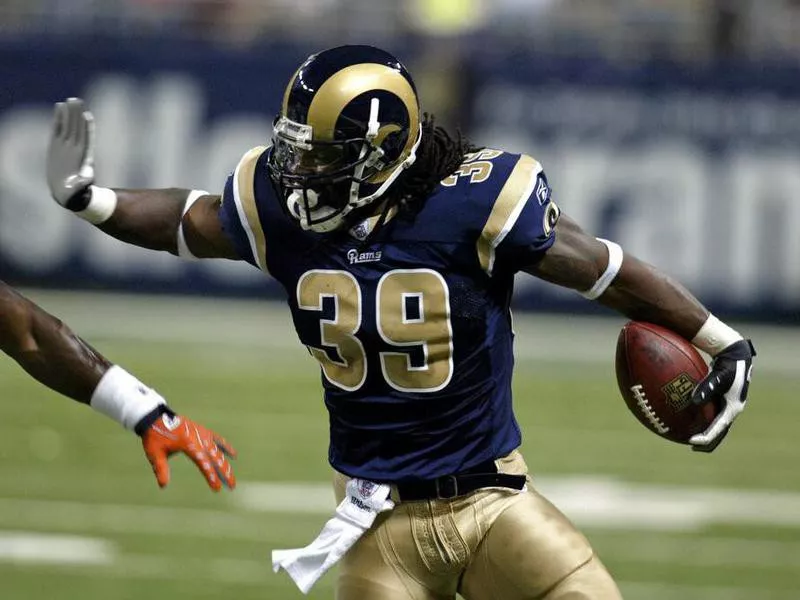 St. Louis Rams running back Steven Jackson runs with ball