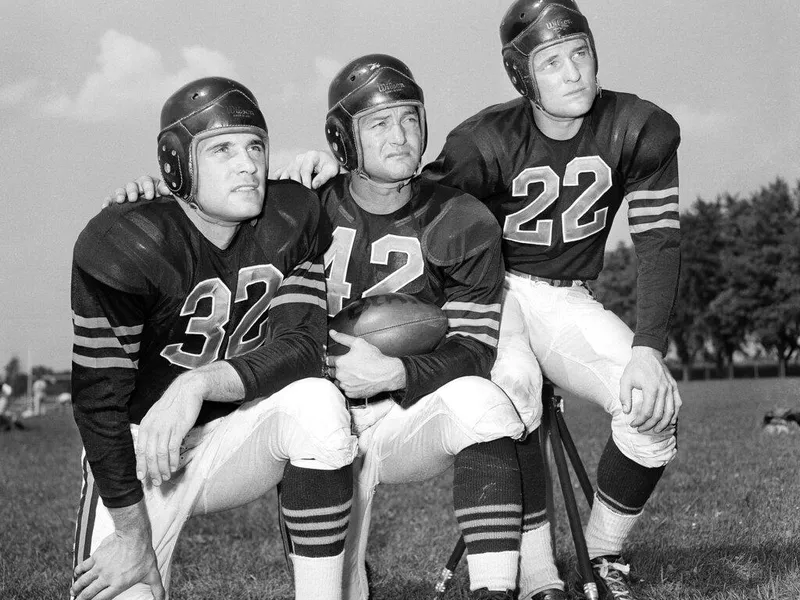 Johnny Lujack, Sid Luckman, Bobby Layne