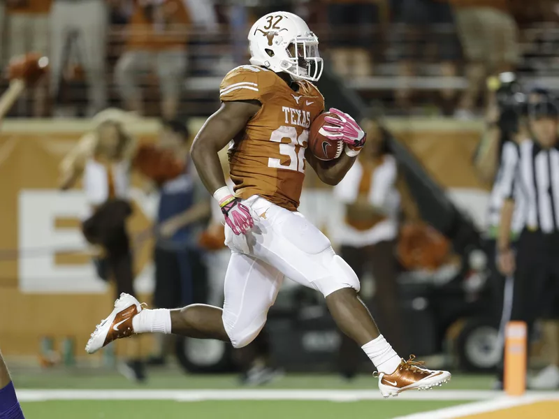 Texas' Johnathan Gray scores against Kansas State