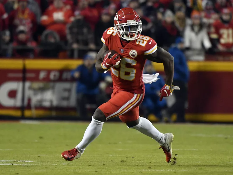 Kansas City Chiefs running back Damien Williams carries ball