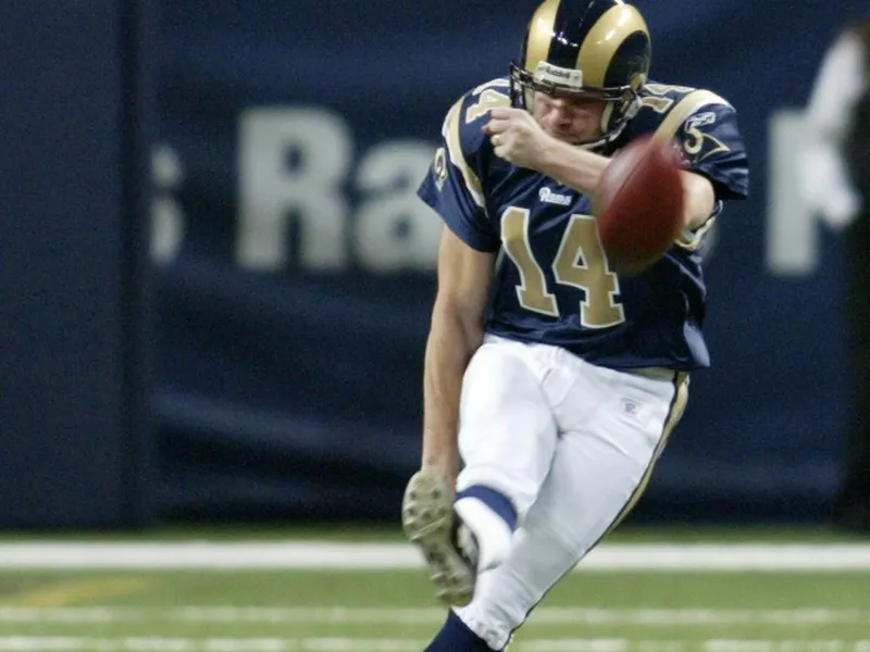 St. Louis Rams kicker Jeff Wilkins kicks off