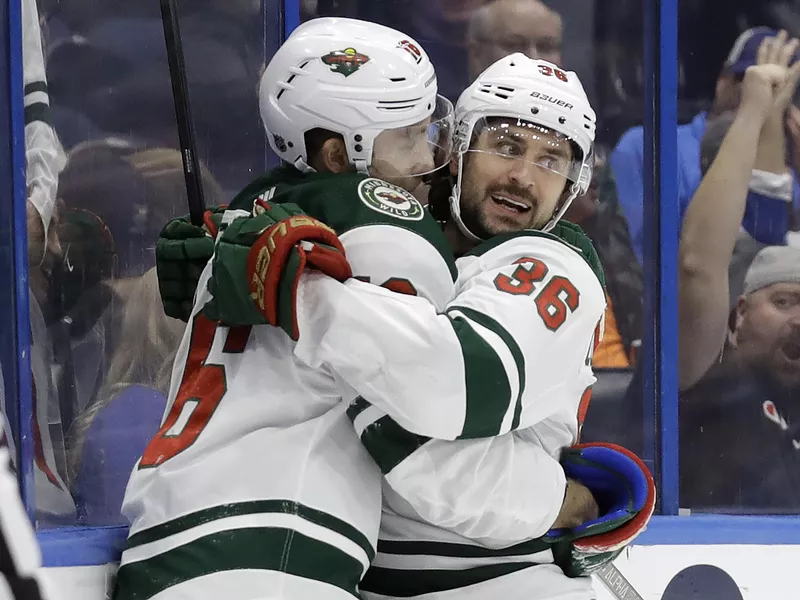 Mats Zuccarello celebrates goal with Jason Zucker