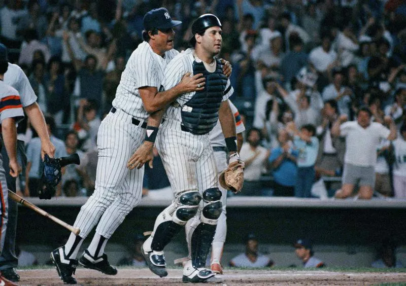 Lou Pinella congratulates Ron Hassey