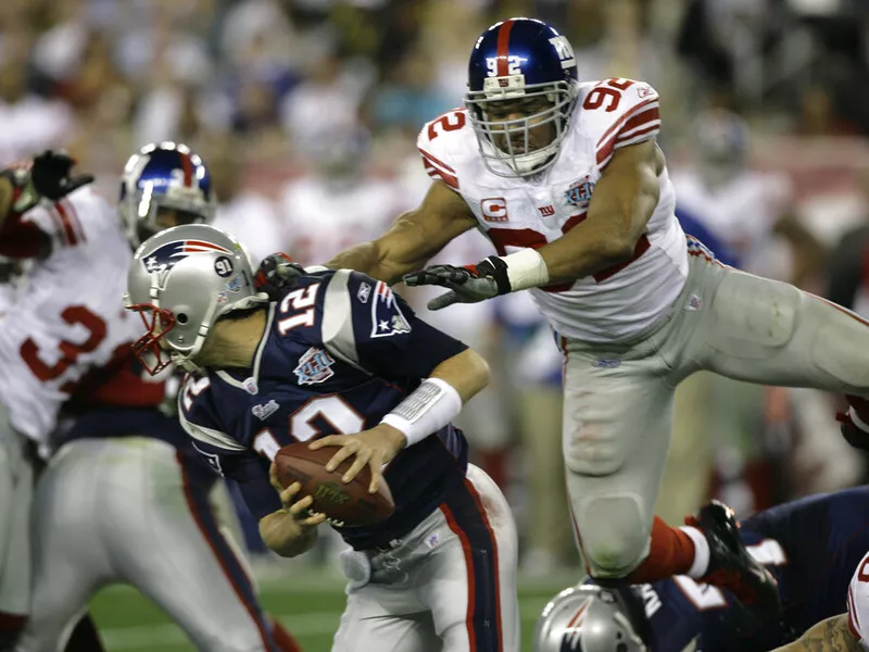 Tom Brady and Michael Strahan