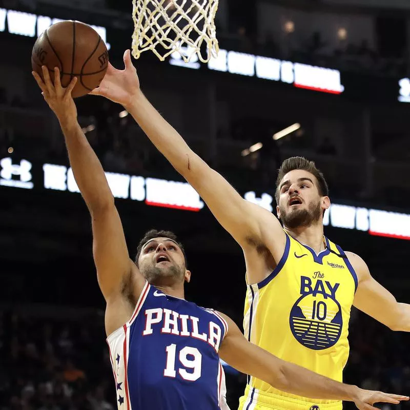 Dragan Bender defends against Raul Neto