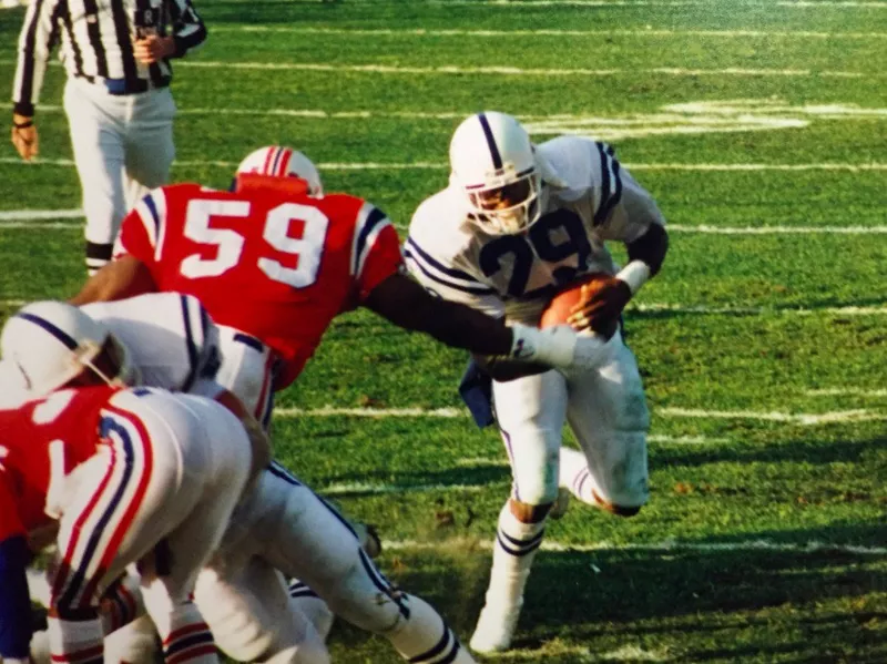 Eric Dickerson getting tackled