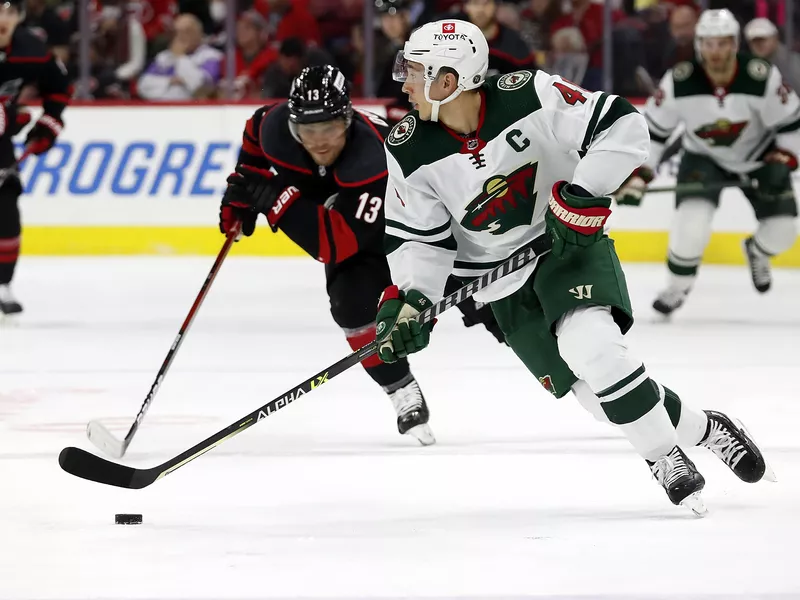 Minnesota Wild's Jared Spurgeon moves puck