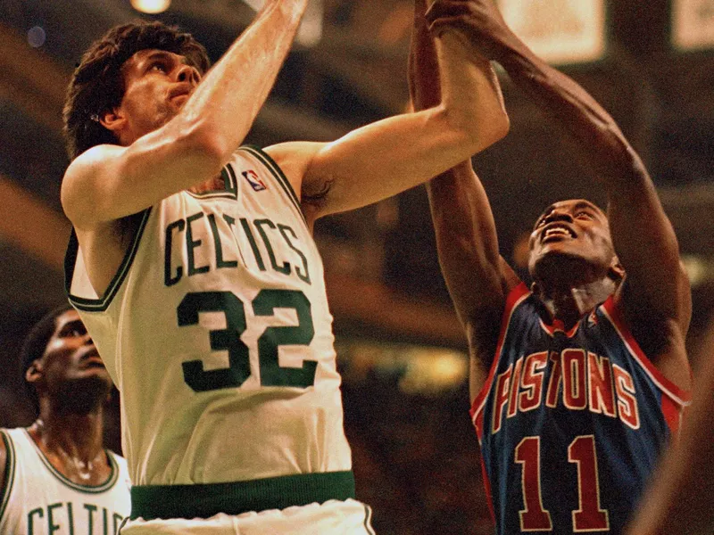 Isiah Thomas fights for rebound against Boston Celtics