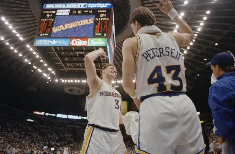 Tom Tolbert and Jim Peterson celebrate