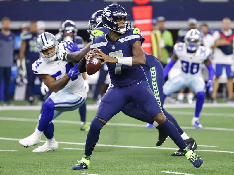 Seattle Seahawks quarterback Geno Smith throwing the ball