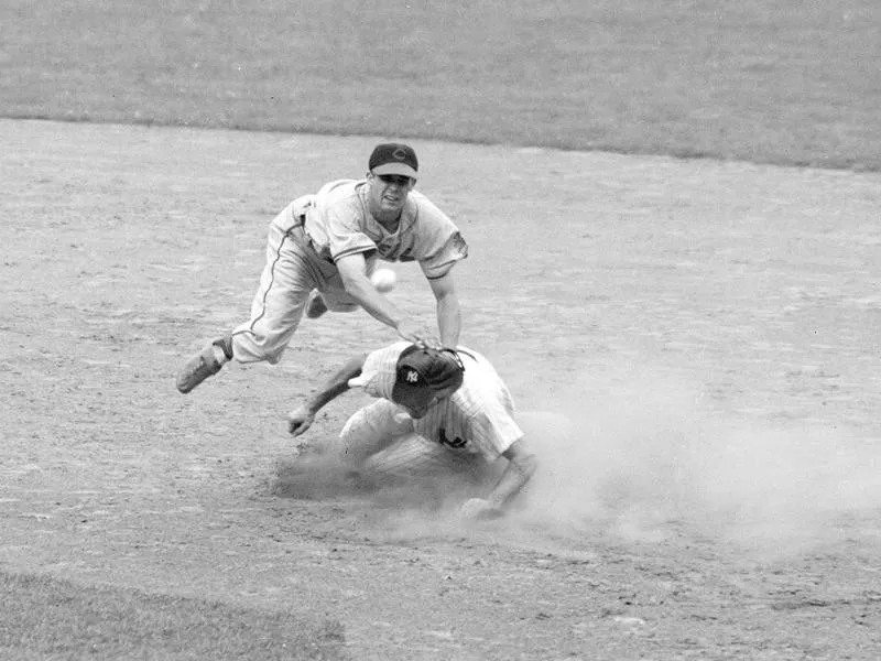 Ray Boone makes double play at second base against New York Yankees