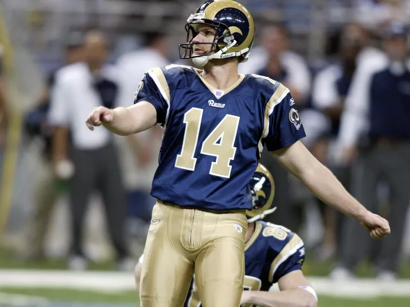 St. Louis Rams kicker Jeff Wilkins watches field goal attempt