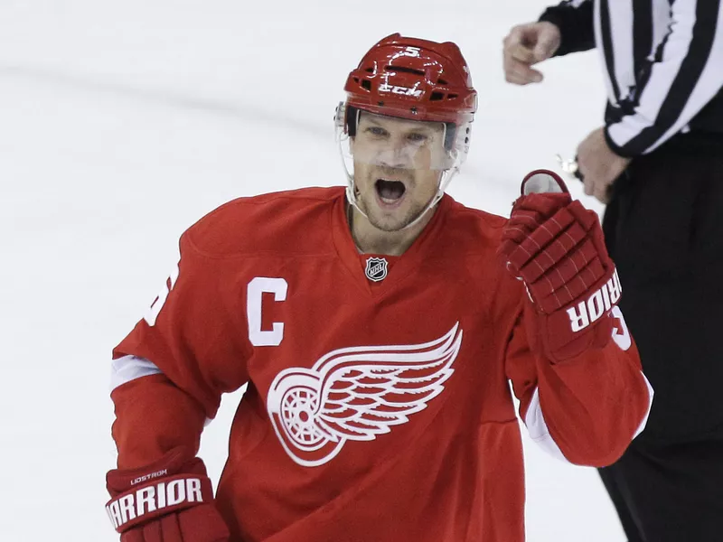 Detroit Red Wings defenseman Nicklas Lidstrom celebrates assist