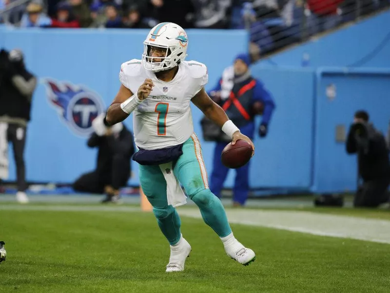 Miami Dolphins quarterback Tua Tagovailoa running