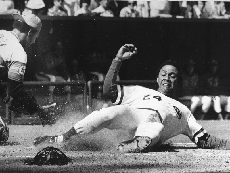 Cincinnati Reds' Tony Perez scores a run