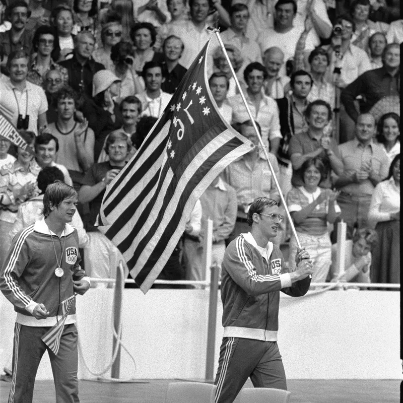 Jim Montgomery, right, and Jack Babashoff on a parade route