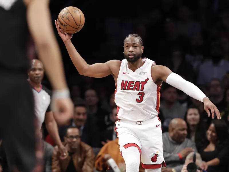 Miami Heat guard Dwyane Wade prepares to pass