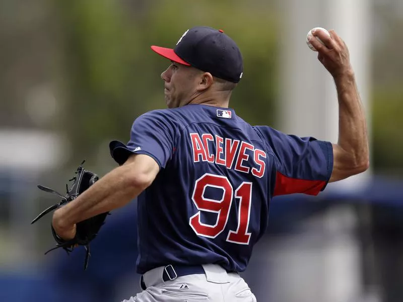 Boston Red Sox relief pitcher Alfredo Aceves delivers