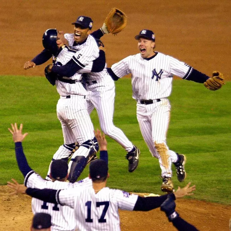 Mariano Rivera celebrating with teammates