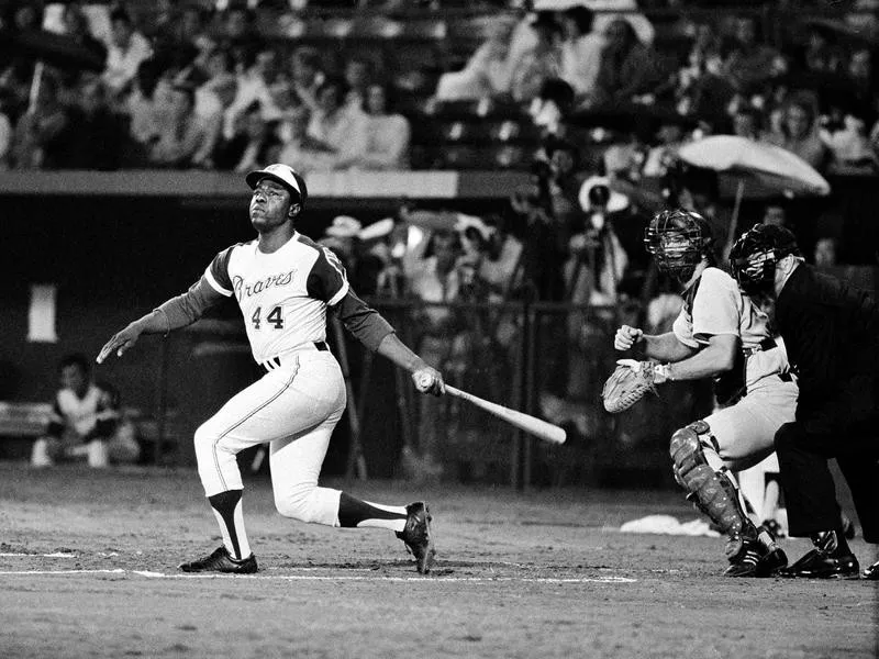 Atlanta Braves' Hank Aaron watches home run