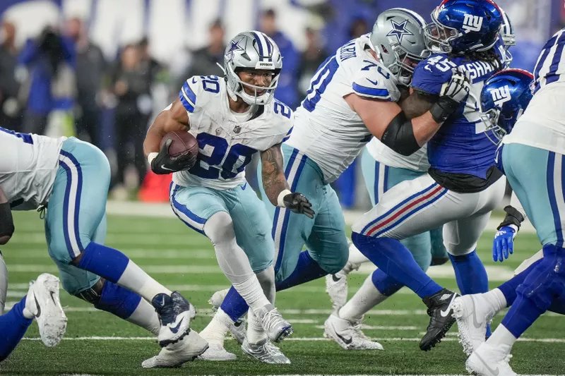 Dallas Cowboys running back Tony Pollard runs the ball