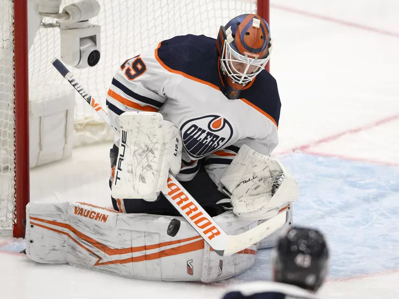 Edmonton Oilers goaltender Mikko Koskinen stops puck