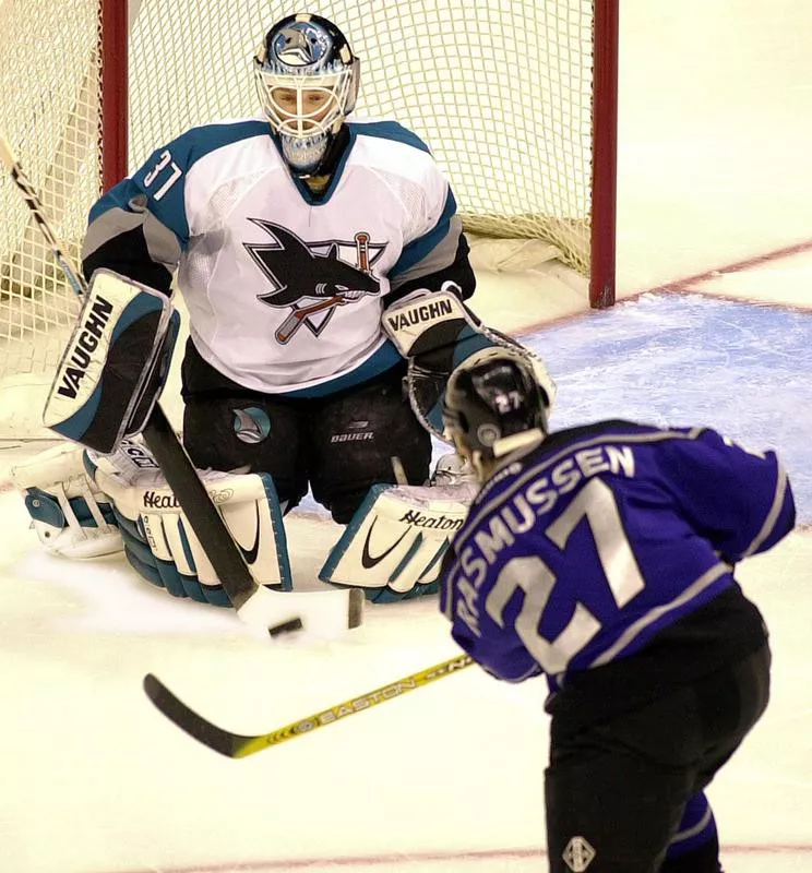 Miikka Kiprusoff blocks a shot on goal