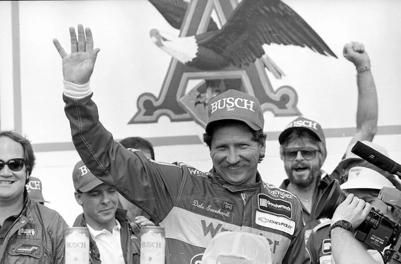 Dale Earnhardt waves after winning Busch Clash