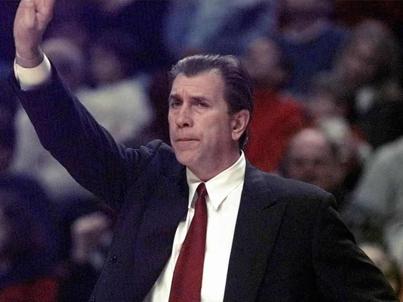 Houston Rockets coach Rudy Tomjanovich signals his team