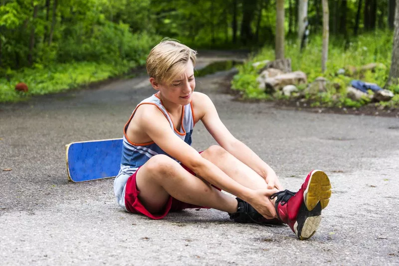 Young boy injured after falling off his skateboard