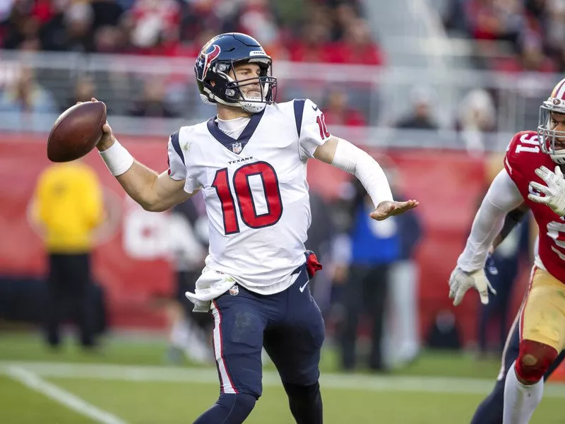 Houston Texans quarterback Davis Mills throwing