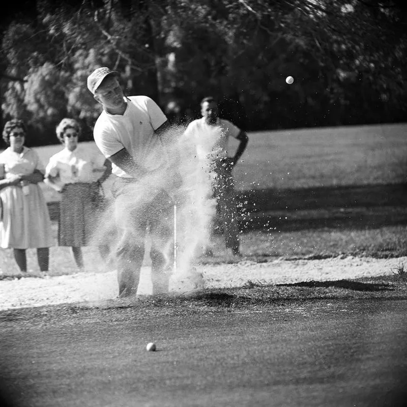 Jack Nicklaus blasts from the sand trap