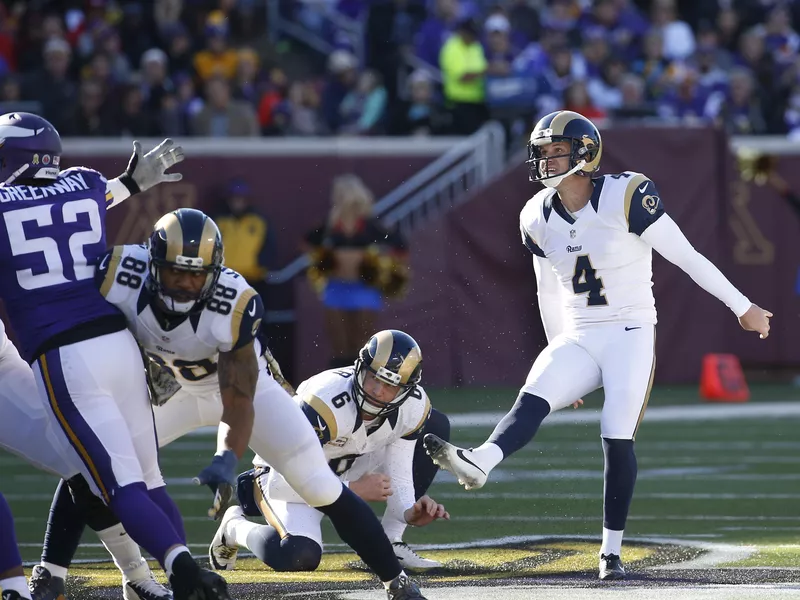 St. Louis Rams kicker Greg Zuerlein follows through