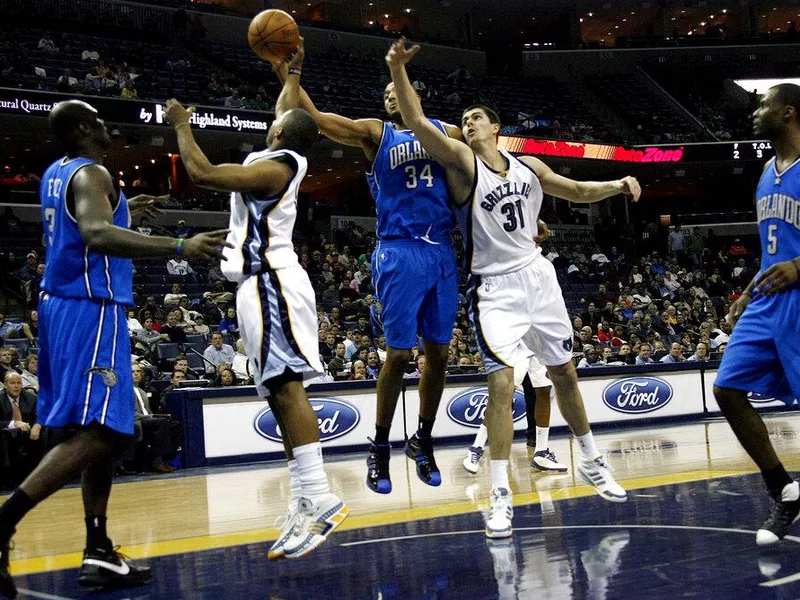 Darko Milicic plays defense against the Orlando Magic