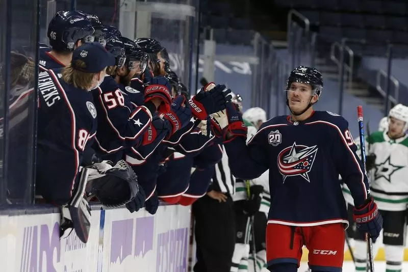 Columbus Blue Jackets center Jack Roslovic celebrates goal