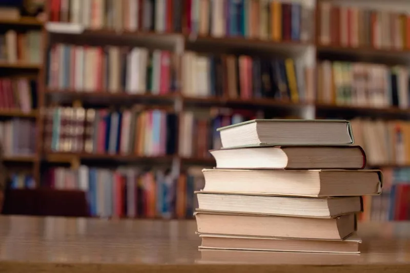 Books on table in library