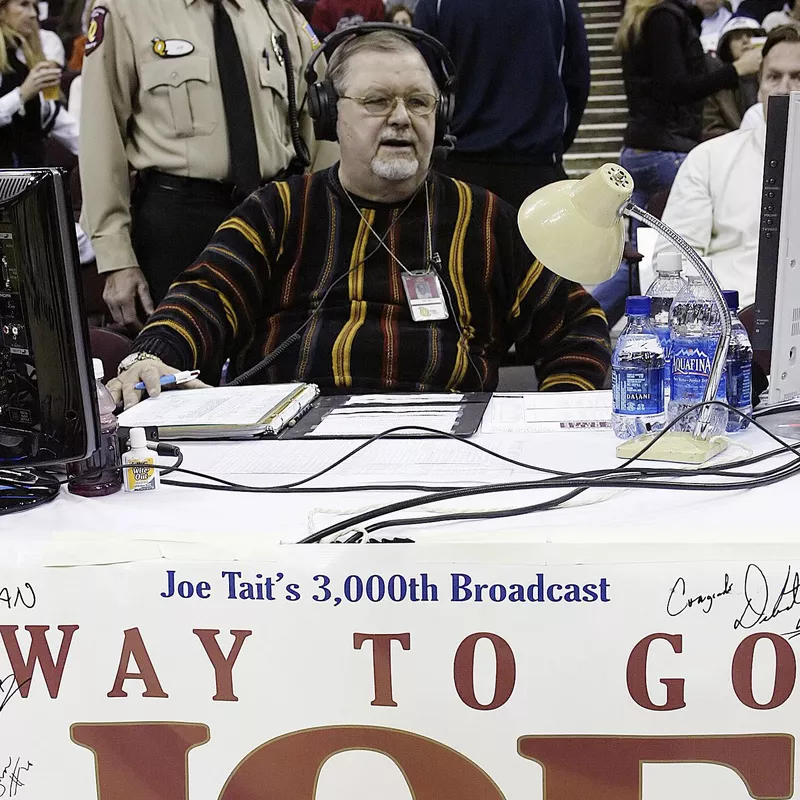 Joe Tait sitting at table